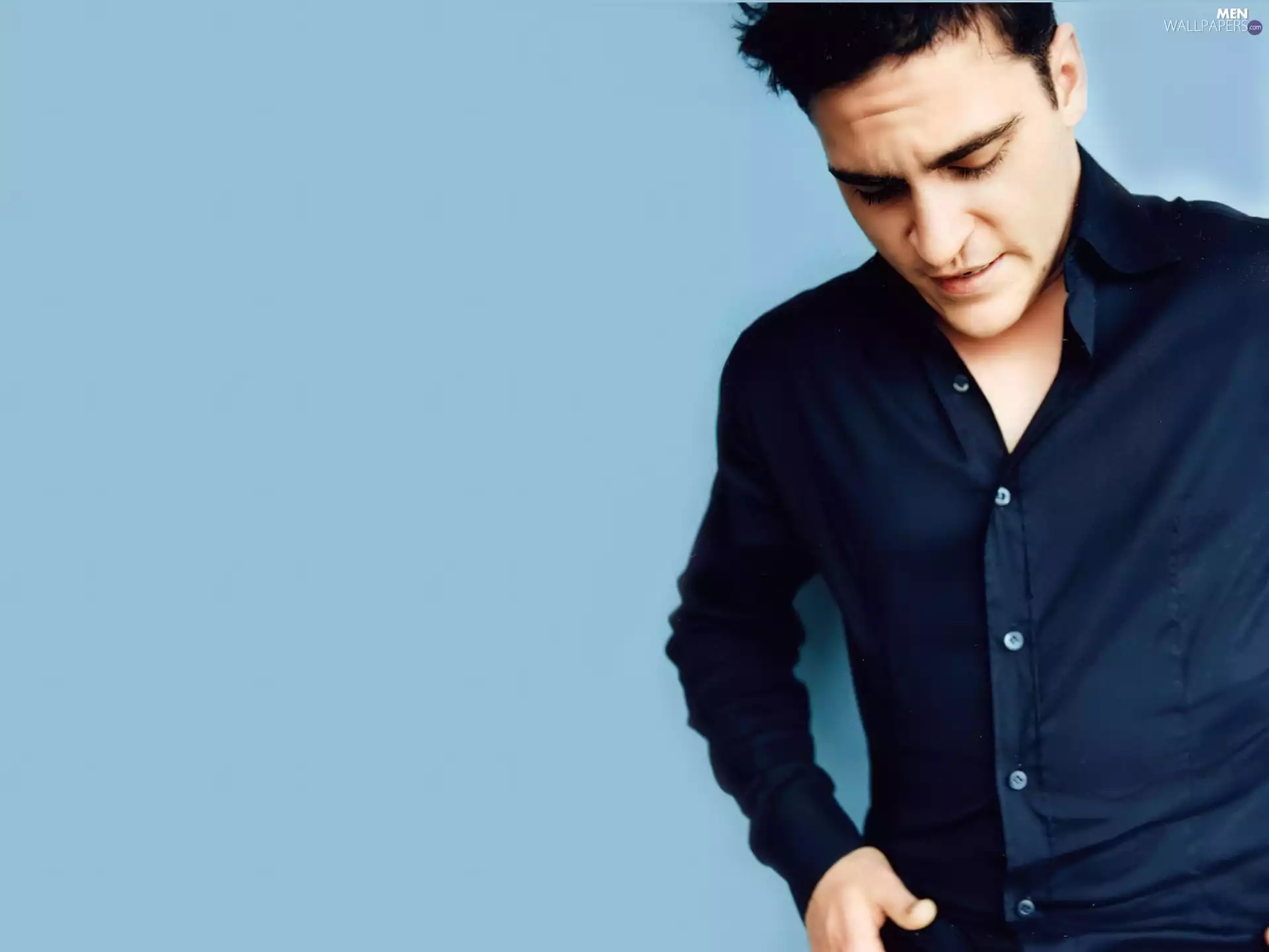 Joaquin Phoenix, black shirt