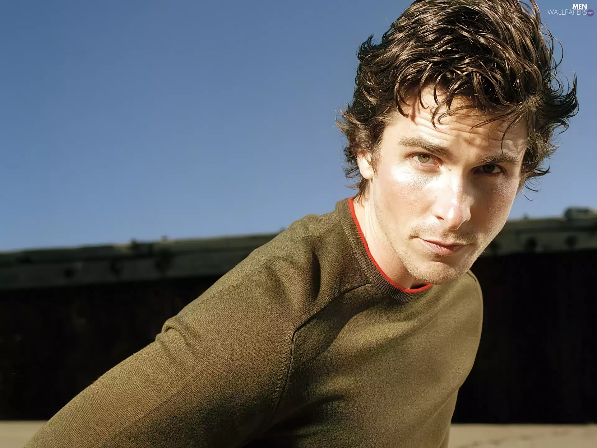 Christian Bale, brown sweater