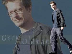 Glasses, Gary Oldman, dark suit