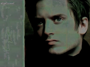 Green eyes, Elijah Wood, dark suit